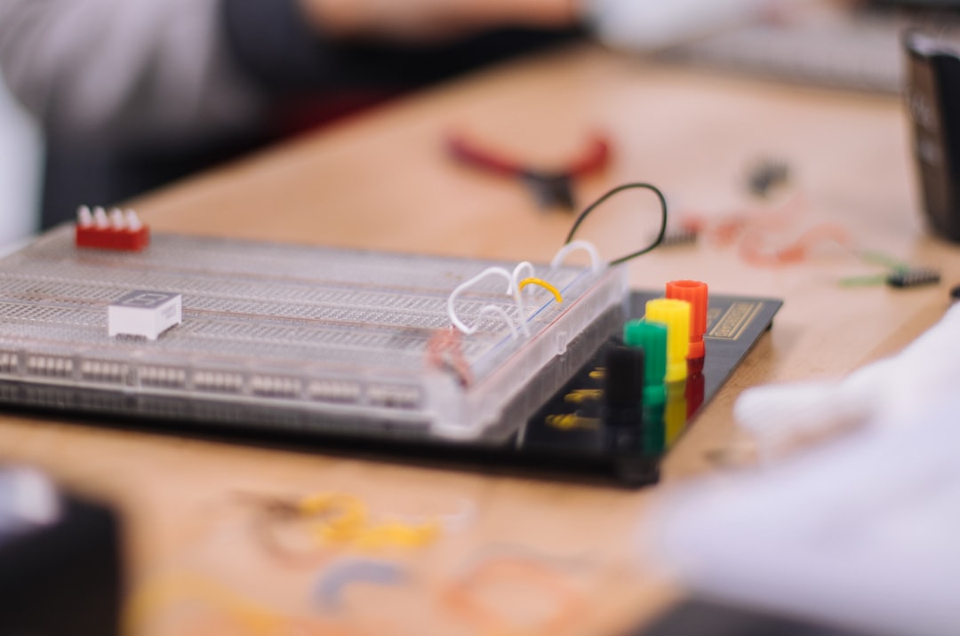 A colorful assortment of educational STEM kits including science experiments, robotics, and engineering projects on a table.